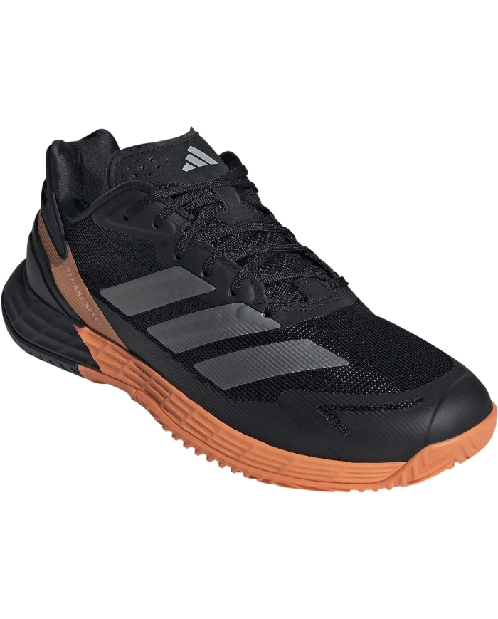 Scarpa da corsa nera Adidas con suola color curry/terracotta, tomaia in mesh, triple stripes grigie e lacci, modello Defiant Spe